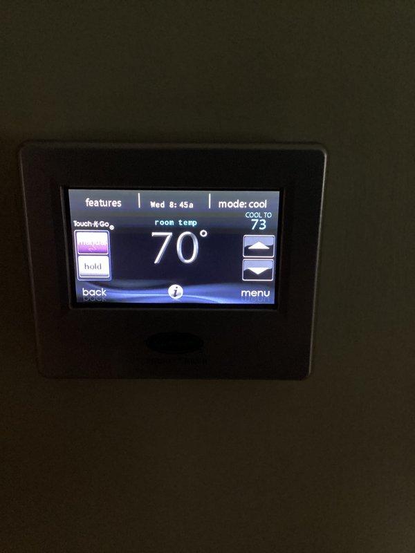 Completed monthly Comfort Care maintenance on residential cooling system per Basic Plus service agreement. Performed standard cooling system inspection and verified thermostat operation showing system set to cool mode with target temperature of 73°F and current room temperature at 70°F. Inspected air filtration system and documented 20x20x2 pleated filter currently installed in HVAC unit. System operating within normal parameters at time of service.