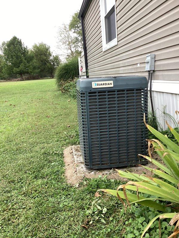 Completed basic monthly heating maintenance visit on residential HVAC system. Upon arrival, found outdoor unit tilted on pad with grass debris accumulated inside cabinet, which was cleared to prevent airflow restriction and potential damage to components. Performed standard heating system inspection and maintenance procedures per recurring service agreement.