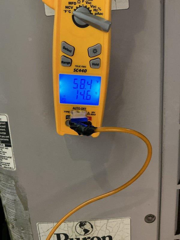 Completed annual spring maintenance visit on HVAC system under CCH basic plan. Inspection revealed extensive rust and corrosion on evaporator coil and refrigerant lines, with heavy oxidation deposits throughout the serpentine coil assembly. Performed electrical diagnostics using digital multimeter, recording voltage readings of 584V and 146V on system components. Documented current system condition with photographs showing significant deterioration of copper piping and coil assembly, indicating potential refrigerant leak concerns and reduced heat transfer efficiency. System requires 16x20x4 filter replacement by customer as filters are not included in basic maintenance plan. Equipment operational at time of service but recommended monitoring for performance decline due to advanced coil corrosion. Plan coverage extends through 10/5/26.