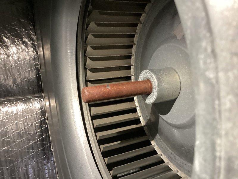 Completed annual cooling maintenance visit on Lennox air handler system. Performed standard inspection of blower assembly, noting significant rust and corrosion on central motor shaft requiring future monitoring. Observed aged ductwork with surface discoloration but functionally intact. Replaced 14x24x1 air filter as included in service. Verified blower wheel operation and airflow through metallic supply ductwork. System operational at time of departure, though motor shaft corrosion should be addressed during next service interval to prevent potential bearing failure.