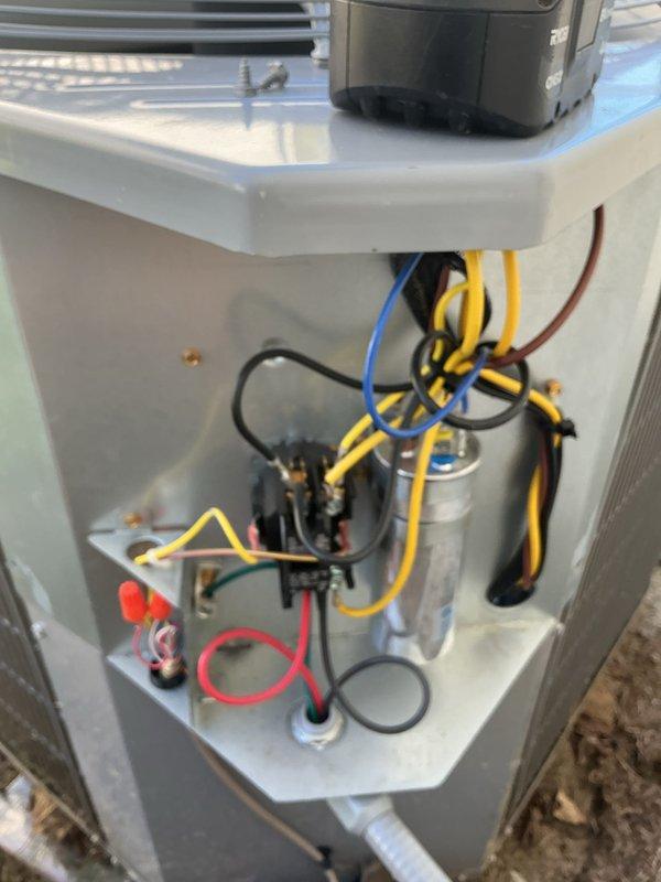 Completed annual heating maintenance on two HVAC systems at this location under active service agreement. Performed comprehensive inspections of both units, including thermostat operation verification, electrical component testing, and visual assessment of all heating system components. Documented system conditions through photographic records showing thermostat displaying 67°F setpoint and interior unit wiring configurations with capacitor, control circuits, and condensate connections all in proper working order.