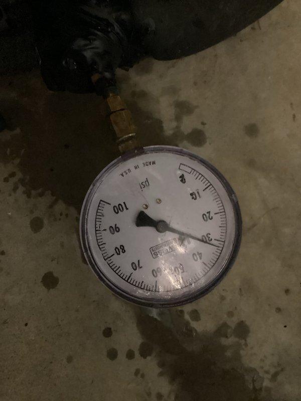 Responded to service call for geothermal heat pump system displaying flashing high pressure fault light upon first heating cycle activation. System defaulted to stage 2 auxiliary heat element instead of operating in geothermal mode. Inspected thermostat settings and confirmed proper temperature display and control functionality. Evaluated system pressure readings using diagnostic gauge to assess refrigerant circuit operation and identify cause of high pressure fault condition.