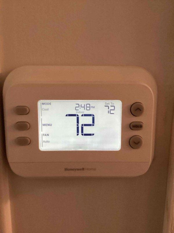 Completed basic monthly heating maintenance visit on residential HVAC system. Performed standard system inspection and verified thermostat operation, which displayed proper functionality at 72°F setpoint in cooling mode with auto fan setting. Filter replacement was not included per service agreement specifications.