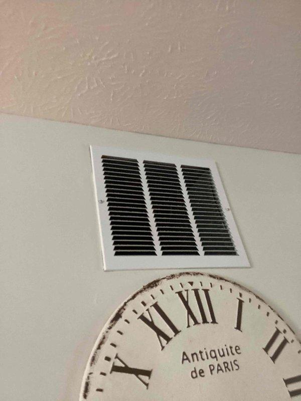Conducted comprehensive duct cleaning estimate for residential property on behalf of realtor. Inspected accessible ductwork system including wall-mounted return air grille and floor-mounted supply registers throughout living areas and bathroom. Assessed condition of ventilation system components and provided detailed scope of work for complete duct cleaning service to prepare property for real estate transaction.