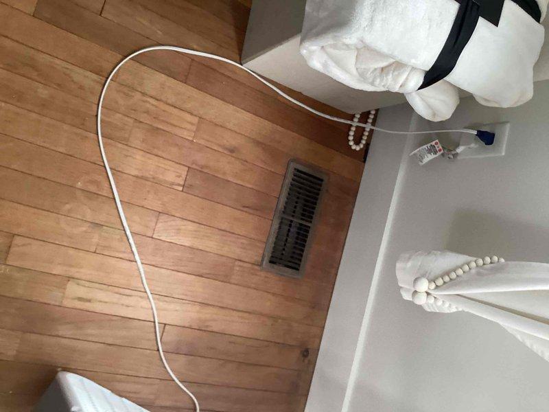 Conducted comprehensive duct cleaning estimate for residential property on behalf of realtor. Inspected accessible ductwork system including wall-mounted return air grille and floor-mounted supply registers throughout living areas and bathroom. Assessed condition of ventilation system components and provided detailed scope of work for complete duct cleaning service to prepare property for real estate transaction.