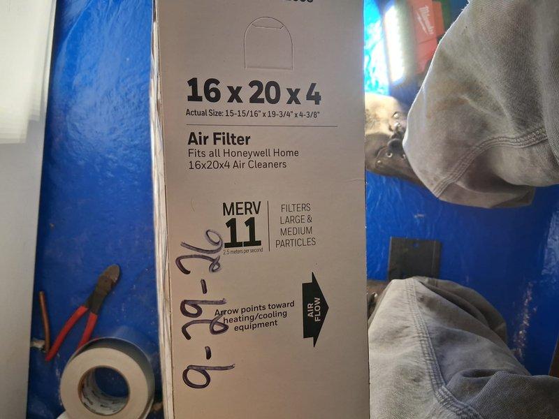 Completed full Goodman heat pump system installation. Installed 16x20x4 MERV 11 air filter in proper orientation per manufacturer specifications. Verified system operation with temperature readings at 50.3 degrees, confirming proper heat pump functionality and airflow through new equipment.
