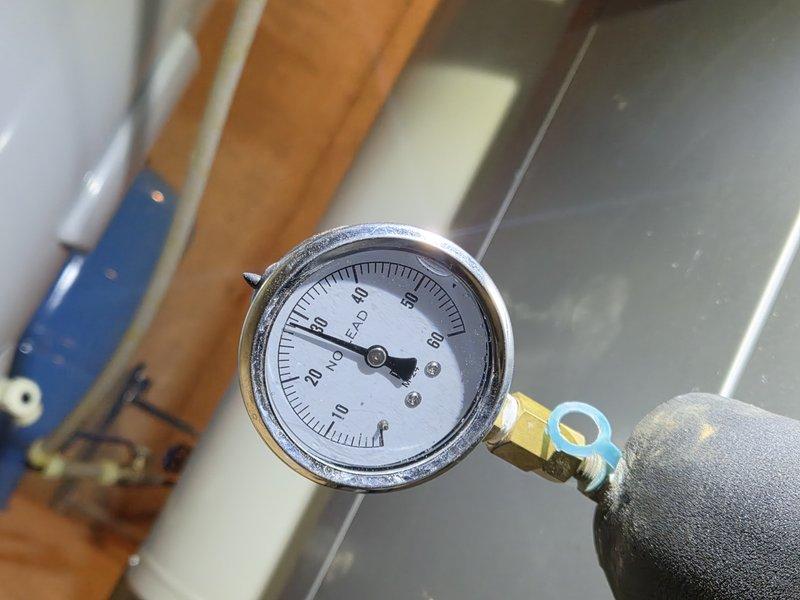 Conducted diagnostic assessment of HVAC system pumps and pressure monitoring equipment. Inspected pressure gauges reading 0-60 PSI range on mechanical equipment to verify system operation and identify wiring deficiencies. Documented current system conditions with pressure readings near zero, indicating pumps require electrical rewiring to restore proper functionality. Return visit scheduled to complete pump rewiring and restore system to full operational capacity.