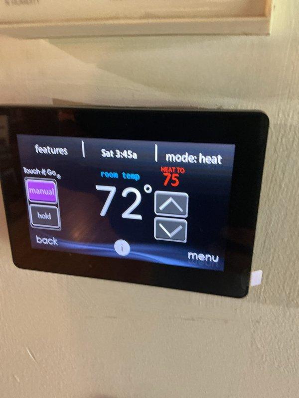 Completed comprehensive HVAC maintenance service including cleaning, checking, and heating system inspection. Verified thermostat operation showing current temperature of 72° with heat set point at 75° in heating mode. Inspected existing 20x20x4 MERV 11 Honeywell air filter in system housing and confirmed proper installation and airflow, though customer-supplied filter replacement was not included in this basic monthly maintenance visit.