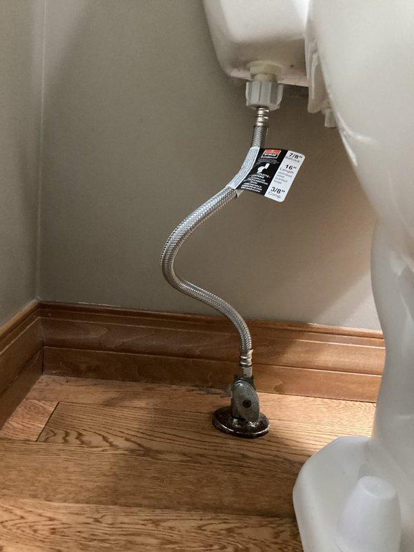 Responded to service call for toilet leak suspected to originate from failed wax ring seal. Upon inspection, confirmed active leak at base of toilet where fixture meets floor flange. Removed toilet from mounting flange, verified deteriorated wax ring as source of water intrusion onto hardwood flooring. Replaced defective wax ring with new seal, reinstalled toilet to proper specifications, and tested water supply line connections for integrity. Verified repair eliminated leak and restored proper function.