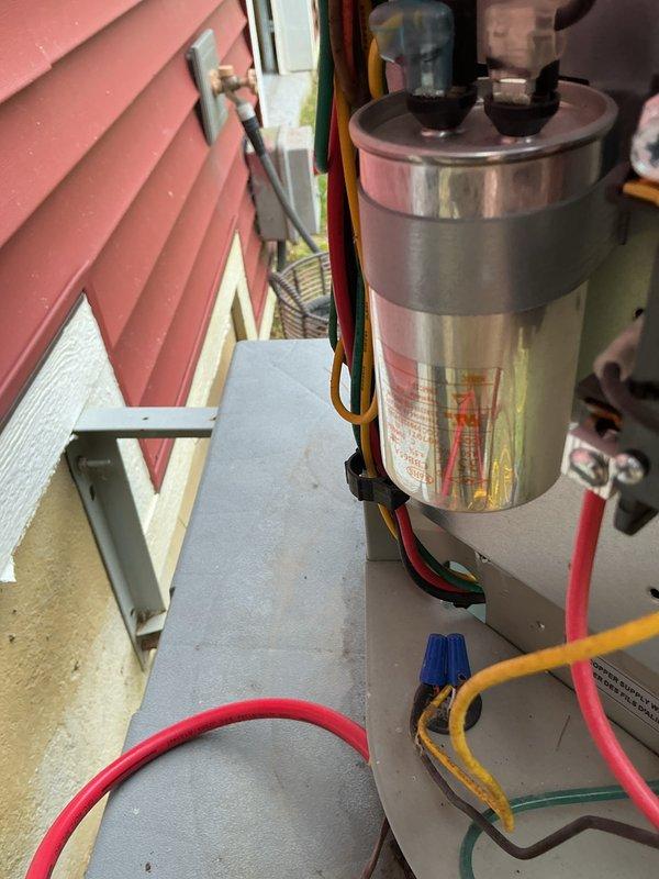 Completed comprehensive preventive maintenance on attic-mounted HVAC system, performing cooling coil and heat pump inspections per value monthly service protocol. Documented equipment conditions with temperature readings at supply register and photographed capacitor assembly with proper wire connections, addressing previous documentation concerns regarding photo clarity.