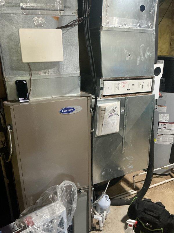 # HVAC Maintenance - Heating System Service

Completed comprehensive basic monthly maintenance on residential HVAC heating system including Carrier air handler unit and associated equipment. Performed standard inspection protocol, verified all mechanical and electrical components operating within manufacturer specifications, and documented system condition through photographic records. Filter size 20x25x4 was noted as not included in service package per customer agreement.