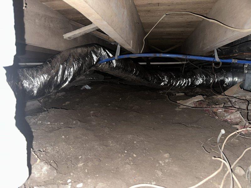 Installed UV light system and treated evaporator coil to improve indoor air quality and system efficiency. Coordinated with plumbing contractor to address improperly secured water lines in crawl space, ensuring proper support and strapping to meet code requirements and prevent future damage.