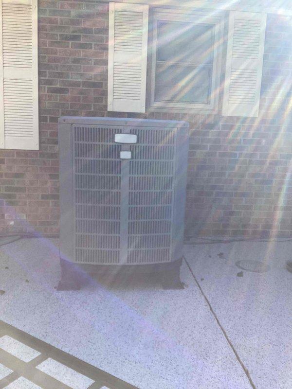 Completed monthly recurring heating maintenance on residential HVAC system. Inspected indoor air handler unit with integrated heating components and verified proper operation of digital thermostat controls. Examined outdoor heat pump unit positioned on concrete pad, confirmed unit integrity and verified refrigerant lines are secure with no visible leaks or damage.