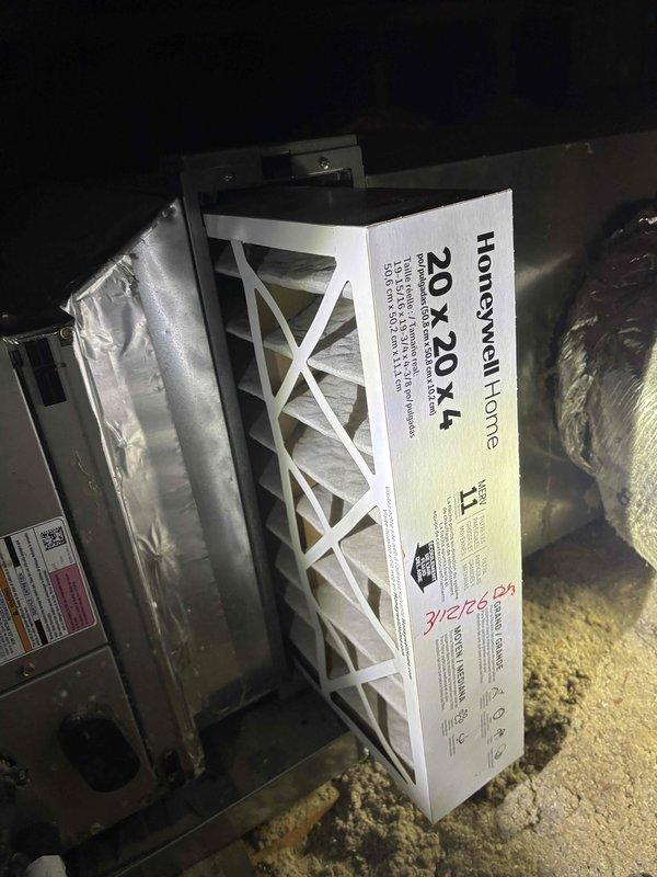 Performed basic monthly heating maintenance on two HVAC systems. Conducted standard heating system inspections including temperature verification using digital thermometer, recording operational readings to confirm proper system performance. Installed customer-supplied 20x20x4 MERV-rated Honeywell air filters in both units. Documented filter installation with date notation for maintenance tracking purposes. Verified blower assembly operation and confirmed all heating components functioning within normal parameters. Systems left in proper working condition with clean filtration in place.