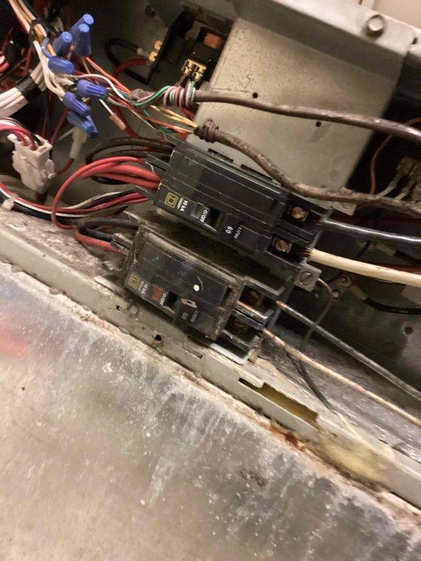 Returned to site with replacement control board, transformers, and circuit breakers to complete HVAC system repair. Installed new electrical components in the unit's control panel, terminated all wiring connections to breakers and control board per manufacturer specifications, and restored power to the system. Verified proper operation of all electrical circuits and confirmed unit functionality upon completion.
