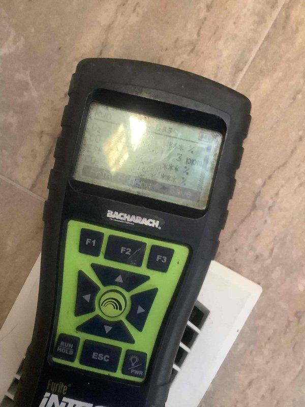Completed annual heating maintenance visit on residential HVAC system. Performed comprehensive safety inspection including carbon monoxide testing at supply register, with readings confirming safe operation at 5 PPM. Conducted combustion analysis and system diagnostics using calibrated testing equipment to verify proper furnace operation and efficiency.