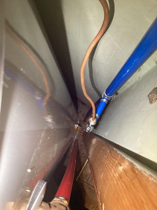 Responded to callback for incomplete ice maker water line installation. Initial technician lacked necessary valve to complete connection. Successfully reinstalled and connected ice maker water line using proper shut-off valve and compression fittings to existing PEX supply line. Verified secure connections at junction point and tested for leaks. Customer expressed interest in proceeding with previously quoted water line replacement project.