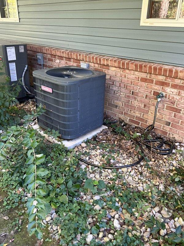Conducted comprehensive comfort advisor consultation for complete HVAC system replacement. Evaluated existing 20-year-old air conditioning condenser unit located on exterior gravel pad with electrical disconnect, and 20-year-old furnace/air handler installed in interior utility closet with vertical ductwork configuration. Documented current equipment conditions through photographic assessment of both indoor and outdoor components. Assessed system layout, existing infrastructure, and replacement requirements. Provided detailed equipment replacement options and recommendations for full system upgrade including both heating and cooling units.