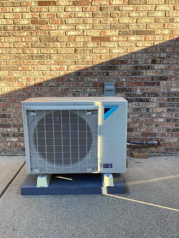 Completed pre-winter heating maintenance tune-up on 4-year-old Daikin split system. Performed comprehensive inspection of outdoor condenser unit and indoor air handler, verifying proper operation of all components. Checked refrigerant lines, condensate drain system with PVC piping, electrical connections, and safety controls including emergency disconnect switch. Unit found to be in good operating condition with all systems functioning within manufacturer specifications.