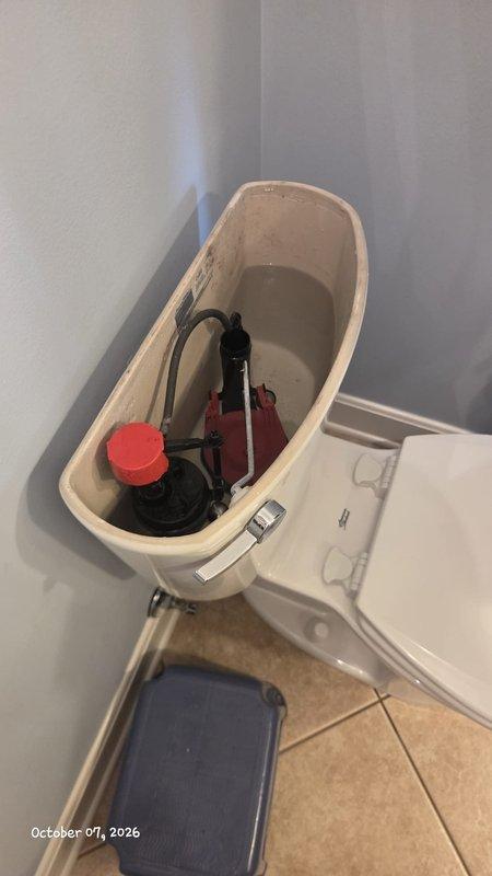 Responded to water leak under kitchen sink. Upon arrival, found disconnected drain pipe beneath sink causing active water leak. Inspected under-sink plumbing assembly including garbage disposal unit, P-trap, and drainage connections. Reconnected and secured loose drain pipe, verified all PVC connections were properly sealed and tightened. Tested system by running water through sink and disposal to confirm leak was resolved and all connections remained secure under flow. Also inspected toilet tank mechanism during visit and documented condition of flush valve assembly. System restored to proper working order with no active leaks detected upon completion.