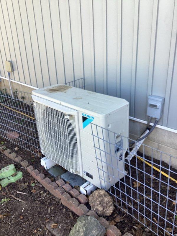 Completed monthly basic heating maintenance visit on Daikin HVAC system. Performed standard system inspection, verified thermostat operation showing 71°F setpoint with 59% humidity reading, and inspected outdoor condenser unit noting dirt accumulation on top surface. Customer to provide 20x25x4 filter for replacement as it is not included in this service plan.