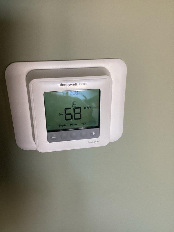 Completed fall heating maintenance tune-up on 2-year-old Heil furnace and heat pump system. Performed comprehensive inspection of all heating components, verified proper system operation, and tested combustion efficiency with readings showing O2 at 9.2% and CO2 at 7.8%. Confirmed thermostat programming and functionality with Honeywell ProSeries unit displaying proper temperature control and fan operation in auto mode. All systems operating within normal parameters with no deficiencies noted.