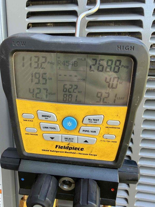 Completed full installation of Lennox heat pump system including indoor air handler and outdoor condensing unit. Installed new digital programmable thermostat with proper wiring and configuration, verified temperature display and control functionality at 71°F setpoint. Performed refrigerant charging procedures using Fieldpiece SMAN manifold gauge set, confirmed proper system pressures at 269.8 PSIA, monitored refrigerant temperatures at 40°C, and verified all operating parameters within manufacturer specifications. System tested and operational.