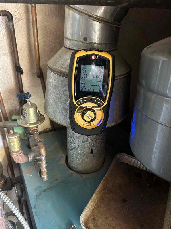 Performed operational assessment on Burnham boiler system to verify continued functionality while awaiting replacement unit. Conducted diagnostic testing using digital meter to evaluate combustion performance, temperature differentials, and system pressures. Inspected copper piping, brass fittings, and isolation valves for leaks or deterioration. Verified water heater connections and expansion tank condition. Confirmed boiler ignition sequence, burner operation, and proper venting through galvanized ductwork. System currently operational and safe for continued use pending new equipment installation.