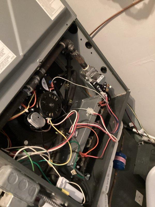 Responded to no heat call on 5-year-old Daikin gas furnace. Upon arrival, thermostat displayed system error code E0 indicating gas furnace fault. Opened furnace control panel and diagnosed issue with gas valve assembly and control board communication. Repaired electrical connections, reset system, and verified proper furnace operation with normal heating restored.