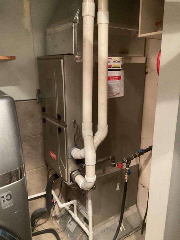 Conducted comprehensive assessment of existing ductwork system located in crawlspace with exterior access. Inspection revealed deteriorated flexible ductwork with significant water accumulation and compromised airflow throughout the residence. Evaluated crawlspace conditions including aged infrastructure, moisture exposure, and accessibility constraints. Documented current HVAC installation including furnace unit, PVC venting system, and existing duct runs. Provided estimate for complete ductwork replacement to restore proper air distribution and eliminate water intrusion issues affecting system performance.