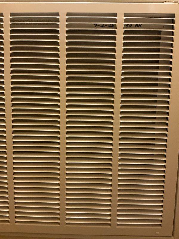 Completed basic monthly heating maintenance visit on Daikin HVAC system. Inspected return air grille and verified proper airflow through ventilation components. Checked digital thermostat operation, confirmed display functioning correctly showing 67°F setpoint with system in cooling mode and 69% humidity reading. Replaced 20x25x1 air filter as part of routine maintenance protocol to ensure optimal system performance and air quality.