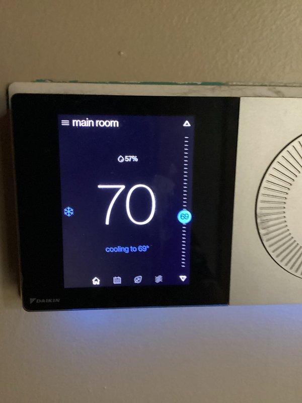 Completed basic monthly heating maintenance visit on CCH and boiler system. Verified thermostat operation showing Daikin unit maintaining proper temperature control at 70°F with system actively cooling to 69°F setpoint and humidity reading at 57%. Measured supply duct temperature at 129.2°F, confirming adequate heat output and proper system performance. All equipment operating within normal parameters.