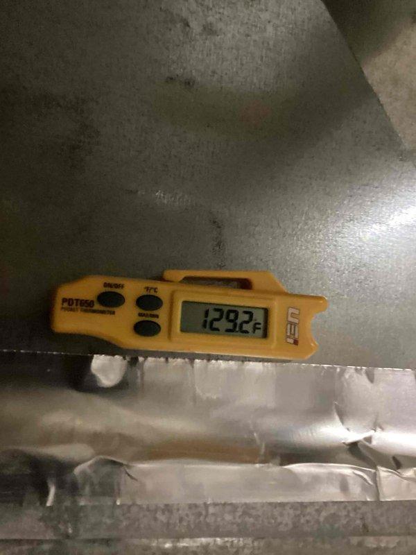 Completed basic monthly heating maintenance visit on CCH and boiler system. Verified thermostat operation showing Daikin unit maintaining proper temperature control at 70°F with system actively cooling to 69°F setpoint and humidity reading at 57%. Measured supply duct temperature at 129.2°F, confirming adequate heat output and proper system performance. All equipment operating within normal parameters.