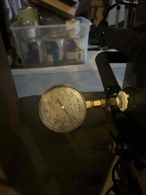 Responded to service call for geothermal heating system operating in emergency heat mode. Performed comprehensive diagnostic inspection of furnace and control systems using digital multimeter to test electrical components, connections, and voltage readings throughout the unit. Conducted pressure testing of the geothermal loop system using analog pressure gauge to verify proper refrigerant pressures and system operation. Inspected all wire harnesses, control modules, transformers, and safety circuits within the air handler compartment. Evaluated emergency heat operation and identified cause of system defaulting to auxiliary heat instead of utilizing geothermal heat pump. All findings documented and system restored to normal geothermal heating operation.
