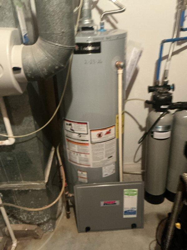 # HVAC Maintenance - Heating System Service

Completed annual basic heating maintenance visit on residential forced-air furnace system located in basement mechanical room. Performed comprehensive visual inspection of furnace unit, verified proper operation of blower motor and heat exchanger, and inspected all accessible ductwork connections for secure fastening and adequate insulation. Examined gas supply lines, electrical connections, and condensate drain system for proper configuration and operation.

Inspected furnace cabinet interior components including burner assembly, ignition system, and flame sensor. Verified proper venting through PVC exhaust and intake piping. Assessed condition of all mechanical and electrical connections throughout the heating system. Confirmed water heater and expansion tank in adjacent area showed no signs of interference with HVAC operation.

System operating within normal parameters at time of service. Customer enrolled in CCH Basic plan with coverage 