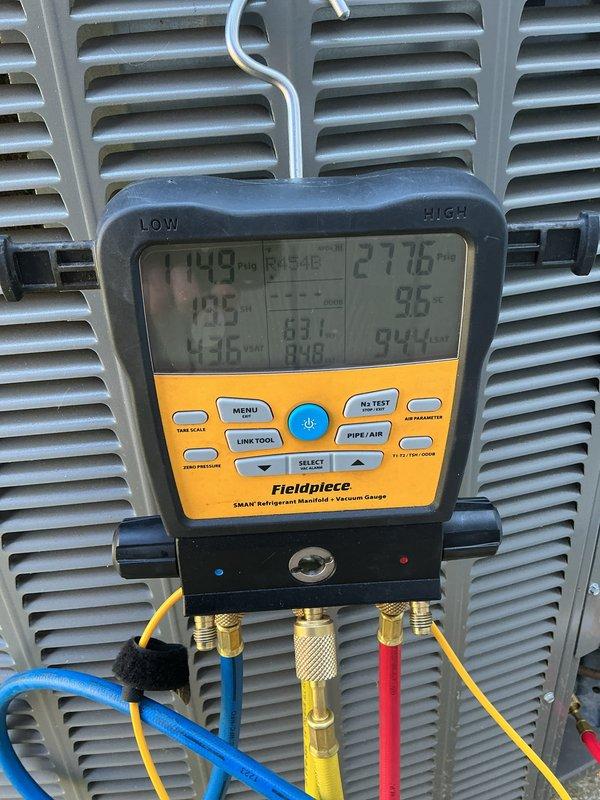 Completed heating tune-up on 9-year-old heat pump system that was installed in spring but had not yet been operated in heating mode. Verified system pressures and temperatures using refrigerant manifold gauges, confirming proper refrigerant charge and operational parameters. Inspected 20x20x4 air filter showing moderate dust accumulation with next change due in 2026, and verified all system components are functioning correctly for the upcoming heating season.