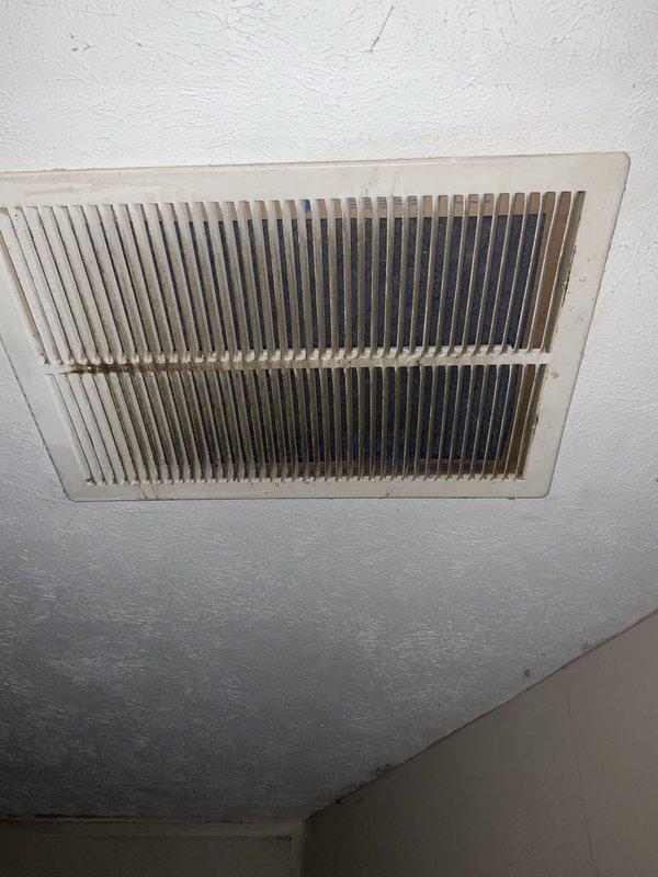 Conducted comprehensive evaluation of 15-year-old heat pump system that has been non-operational for heating for several years. Inspected outdoor heat pump unit and assessed overall system condition including indoor air handler and ductwork. Documented existing equipment specifications, noted significant dust and debris accumulation on return air grille indicating poor filtration and maintenance history. Provided detailed replacement estimate options for both heat pump replacement and complete HVAC system upgrade, discussed available financing solutions to facilitate equipment replacement decision.