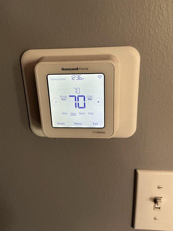 Completed basic monthly heating maintenance visit on CCHP system. Performed standard system inspection and verified Honeywell Home ProSeries thermostat operation, confirming proper heating mode function, schedule following capability, and temperature control at 70°F setpoint. All components operating within normal parameters at time of service.