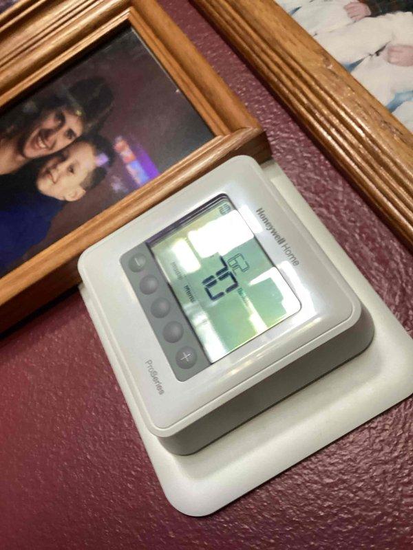 Completed monthly basic heating maintenance visit on residential HVAC system. Performed standard system inspection, replaced 16x25x1 air filter, and verified thermostat operation showing proper temperature reading of 73°F on Honeywell PRO Series digital unit. All heating components functioning within normal parameters.