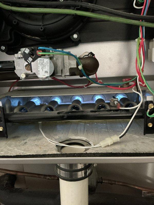 Completed Basic Heating Visit - Monthly recurring maintenance on residential forced-air gas furnace system. Performed comprehensive inspection of all heating components including gas valve assembly, burner assembly, ignition system, and blower motor. Verified proper operation of multi-stage gas valve with all control wiring connections intact and secure. Inspected blue burner manifold assembly confirming all ports clear and properly aligned. Checked condensate drain line for proper drainage and blockages. Verified Bryant thermostat functionality with current setpoint at 72°F and confirmed proper communication between thermostat and heating system across all comfort modes (home, away, sleep). All system components operating within normal parameters with no issues identified during this routine maintenance visit.