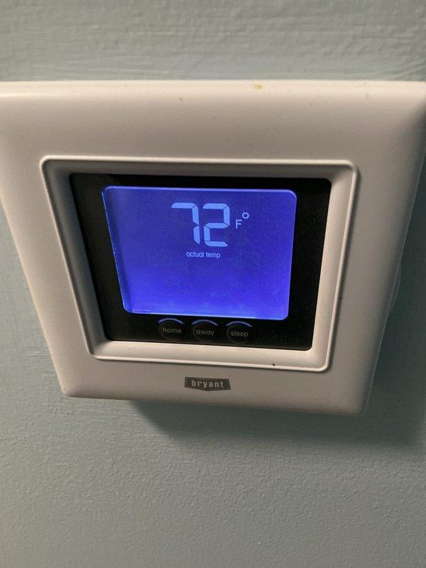 Completed Basic Heating Visit - Monthly recurring maintenance on residential forced-air gas furnace system. Performed comprehensive inspection of all heating components including gas valve assembly, burner assembly, ignition system, and blower motor. Verified proper operation of multi-stage gas valve with all control wiring connections intact and secure. Inspected blue burner manifold assembly confirming all ports clear and properly aligned. Checked condensate drain line for proper drainage and blockages. Verified Bryant thermostat functionality with current setpoint at 72°F and confirmed proper communication between thermostat and heating system across all comfort modes (home, away, sleep). All system components operating within normal parameters with no issues identified during this routine maintenance visit.