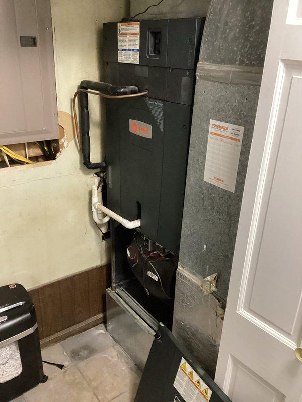 Responded to service call for water overflow from HVAC system caused by clogged condensate drain line. Successfully cleared the blockage from the drain system, restoring proper drainage function and preventing further water discharge from the air handler unit. Verified system operation and confirmed condensate is draining properly through cleared drain line.
