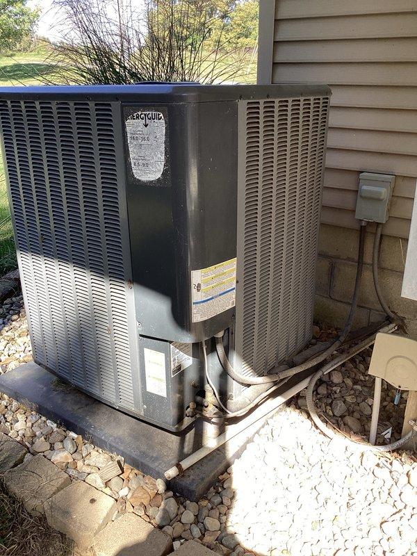Completed basic monthly heating maintenance visit on residential HVAC system. Performed standard inspection of outdoor condensing unit and verified thermostat operation showing 70 degrees with fan set to auto mode. Unable to document filter size during this visit as location was not accessible or size was not clearly marked; filter size documentation required for future service records.