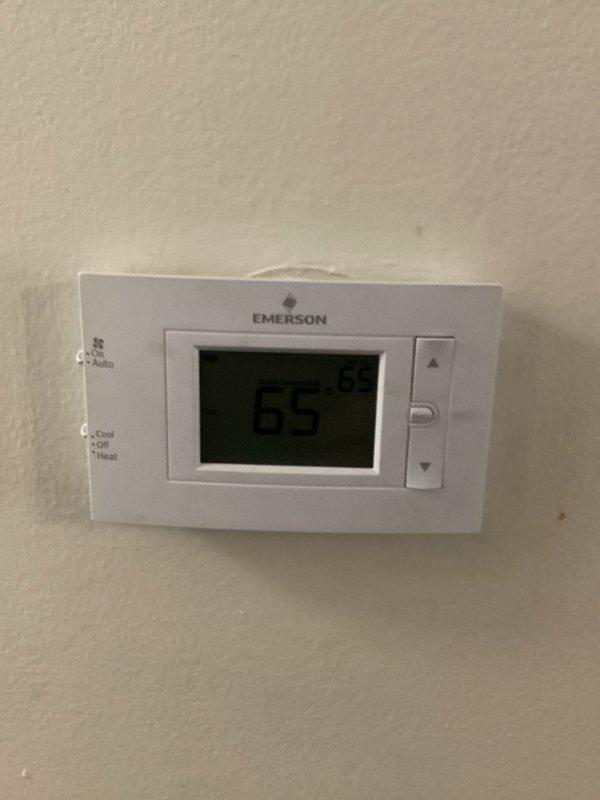 Conducted on-site assessment for residential duct cleaning service. Inspected exterior property access points and evaluated current HVAC system operation, noting thermostat set at 65 degrees. Documented existing conditions through photographic documentation of outdoor work areas and interior climate control equipment to provide comprehensive estimate for complete duct system cleaning and sanitization services.