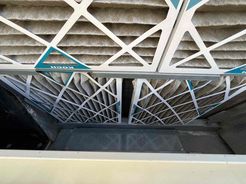 Completed monthly basic heating maintenance visit on four commercial rooftop HVAC units. Inspected all units, replaced dirty 20x25x2 pleated air filters with new filters across all systems, and verified proper operation of heating components. All units operational and filters restocked for future service visits through contract expiration.