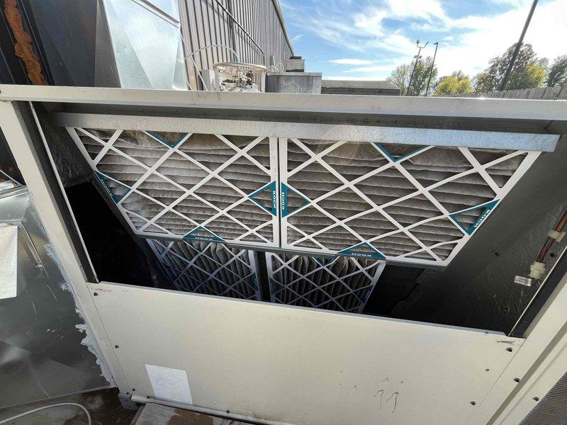 Completed monthly basic heating maintenance visit on four commercial rooftop HVAC units. Inspected all units, replaced dirty 20x25x2 pleated air filters with new filters across all systems, and verified proper operation of heating components. All units operational and filters restocked for future service visits through contract expiration.