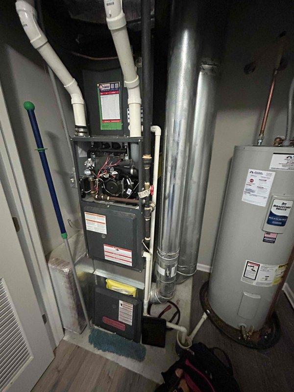 Performed second opinion inspection of furnace system following concerns raised by previous contractor regarding corroded piping and cabinet cleanliness. Inspected PVC venting system, internal furnace components, gas connections, and blower assembly with access panel removed. Evaluated condition of condensate drain lines and filter cabinet area above blower compartment to provide assessment and recommendations for pipe repair versus replacement options.