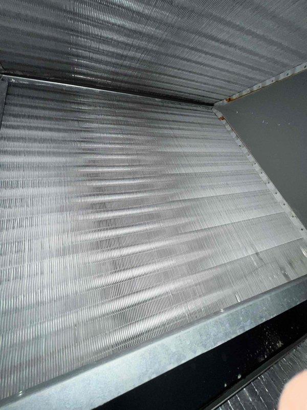 Completed annual basic heating maintenance visit on residential HVAC system. Performed standard inspection of furnace components, heat exchanger, and blower assembly. Observed dust and particulate accumulation on evaporator coils and heat exchanger fins, which is typical for systems in regular operation. Verified all mechanical components, refrigerant lines, and PVC condensate drainage piping are intact and properly connected. System is operational and functioning within normal parameters under current service agreement coverage.
