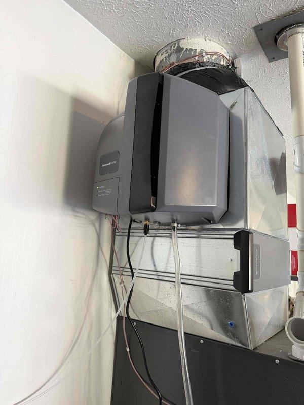 Completed installation of new power humidifier integrated with existing HVAC system. Unit was professionally mounted, connected to water supply and ductwork, with all electrical connections properly terminated and tested. System was commissioned and verified operational with proper humidity output levels.