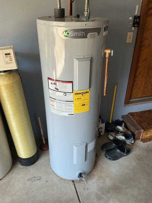 Performed scheduled monthly heating system maintenance, including inspection of the blower assembly and replacement of the 20x20x1 air filter. Observed light dust and powdery residue buildup on the blower housing exterior and inspected the motor shaft and blower interior for proper condition. System was left in operational condition following service.